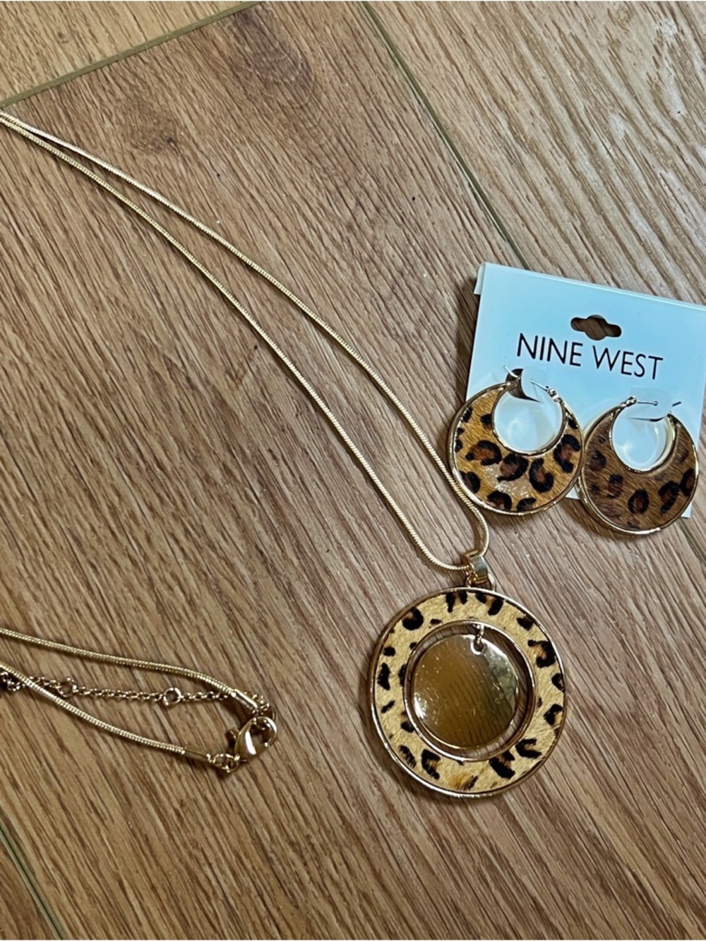 Nine West Gold Long Pendant Necklace with Leopard Ring Accent - Picture 2 of 7